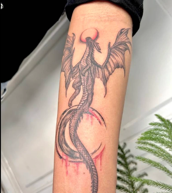 Dragon tattoo on forearm