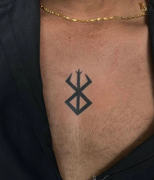Minimal chest tattoo