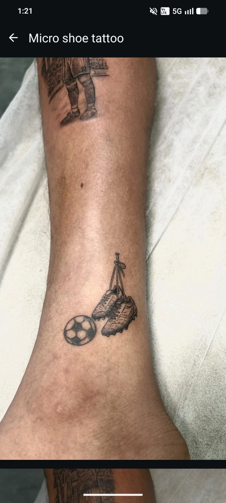 Fine line geometric band tattoo